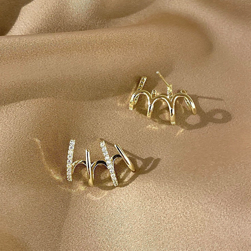 925 Silber Ohrstecker mit vierfach Zirkonia-Fassung